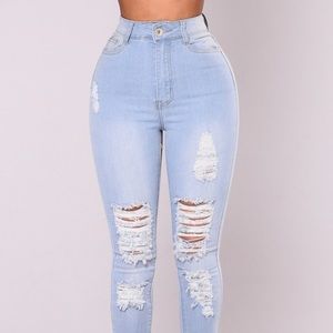 Light blue distressed skinny jeans